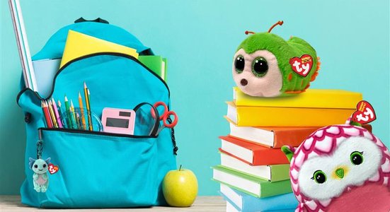 Beanies with backpack and stack of books