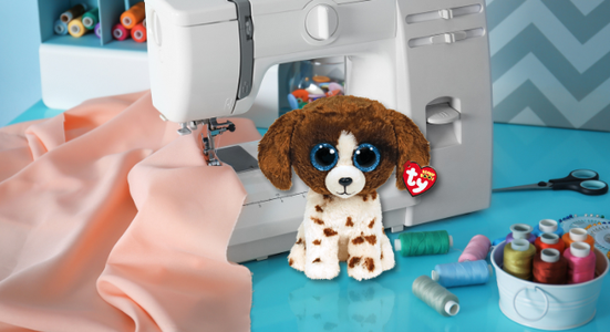 Beanie Boo next to sewing machine