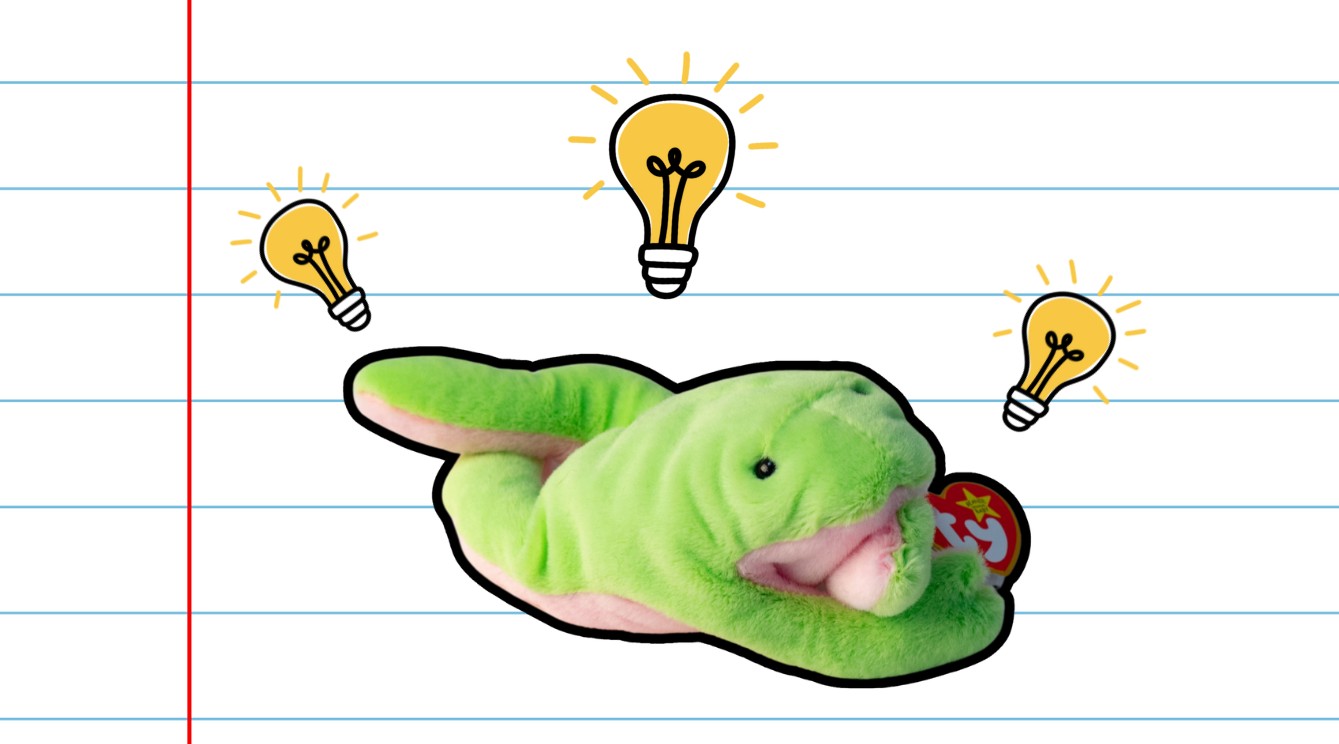 Beanie Baby on notebook paper with light bulbs around them